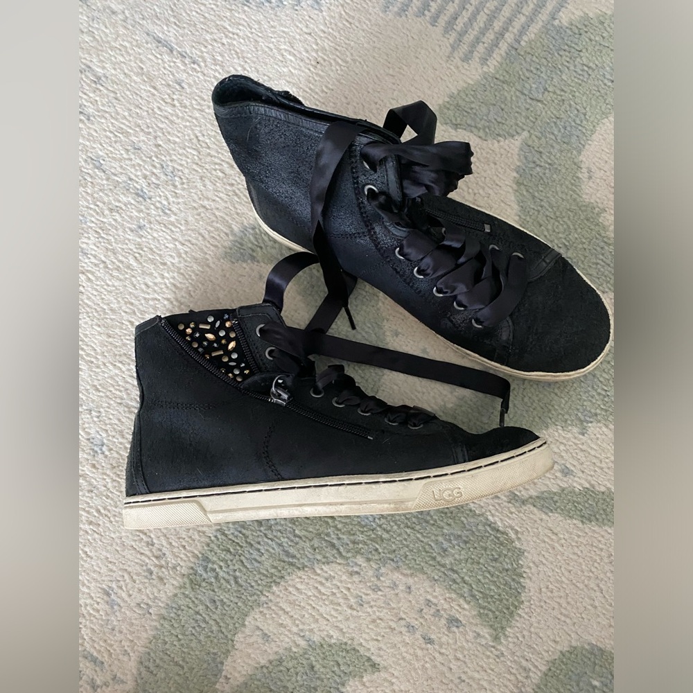 Women’s black leather Ugg high tops size 8